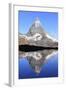 Hiker Admiring the Matterhorn Reflected in Lake Stellisee, Swiss Alps-Roberto Moiola-Framed Photographic Print