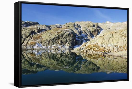 Hiker at Lac Blanc, Chamonix, Haute-Savoie, French Alps, France, Europe-Christian Kober-Framed Stretched Canvas