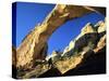 Hiker Below Natural Navajo Sandstone Hickman Bridge, Capitol Reef National Park, Utah, Usa-Scott T. Smith-Stretched Canvas