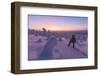 Hiker in the snowy forest at dusk, Riisitunturi National Park, Posio, Lapland, Finland-Roberto Moiola-Framed Photographic Print