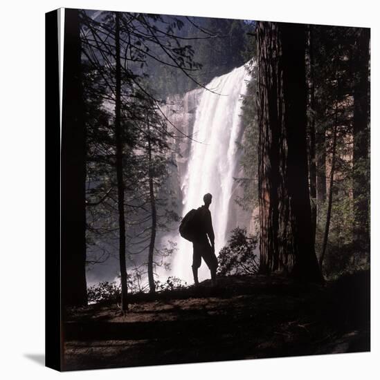 Hiker Looking at Vernal Falls in Yosemite National Park-Ralph Crane-Stretched Canvas