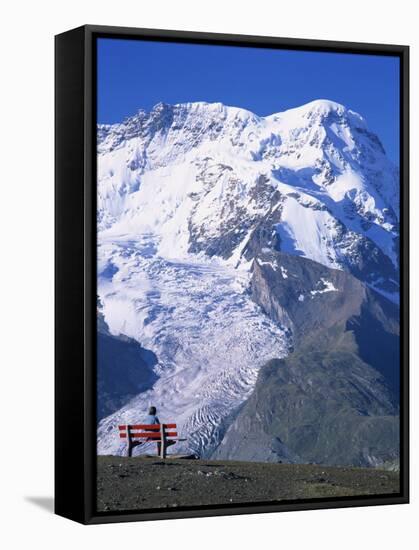 Hiker on Bench, the Breithorn and Breithorn Glacier, Rotenboden, Zermatt, Valais, Switzerland-Tomlinson Ruth-Framed Stretched Canvas