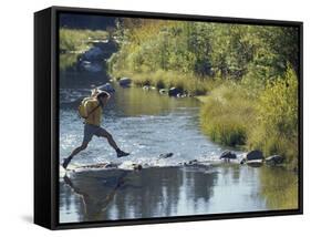 Hiker on Stepping Stones-null-Framed Stretched Canvas