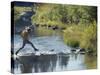 Hiker on Stepping Stones-null-Stretched Canvas