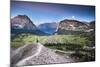 Hiker under Full Moon in Glacier National Park, Montana-Lindsay Daniels-Mounted Photographic Print