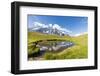 Hiker with dog admires the peaks of Mont De La Saxe reflected in water, Courmayeur, Aosta Valley, I-Roberto Moiola-Framed Photographic Print