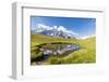 Hiker with dog admires the peaks of Mont De La Saxe reflected in water, Courmayeur, Aosta Valley, I-Roberto Moiola-Framed Photographic Print