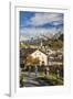 Hikers admire Ardez village surrounded by woods and snowy peaks Lower Engadine Canton of Switzerlan-ClickAlps-Framed Photographic Print