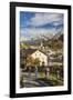 Hikers admire Ardez village surrounded by woods and snowy peaks Lower Engadine Canton of Switzerlan-ClickAlps-Framed Photographic Print