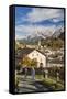 Hikers admire Ardez village surrounded by woods and snowy peaks Lower Engadine Canton of Switzerlan-ClickAlps-Framed Stretched Canvas