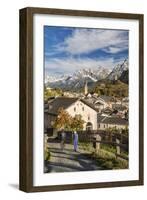 Hikers admire Ardez village surrounded by woods and snowy peaks Lower Engadine Canton of Switzerlan-ClickAlps-Framed Photographic Print