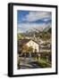 Hikers admire Ardez village surrounded by woods and snowy peaks Lower Engadine Canton of Switzerlan-ClickAlps-Framed Photographic Print