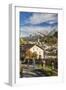 Hikers admire Ardez village surrounded by woods and snowy peaks Lower Engadine Canton of Switzerlan-ClickAlps-Framed Photographic Print