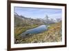 Hikers Admire the Matterhorn Reflected in Lake Stellisee, Swiss Alps-Roberto Moiola-Framed Photographic Print