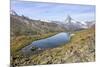 Hikers Admire the Matterhorn Reflected in Lake Stellisee, Swiss Alps-Roberto Moiola-Mounted Photographic Print