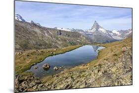 Hikers Admire the Matterhorn Reflected in Lake Stellisee, Swiss Alps-Roberto Moiola-Mounted Photographic Print