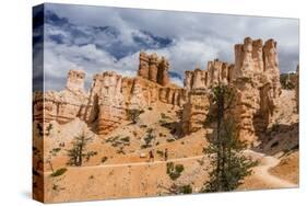 Hikers amongst hoodoo formations on the Fairyland Trail in Bryce Canyon National Park, Utah, United-Michael Nolan-Stretched Canvas