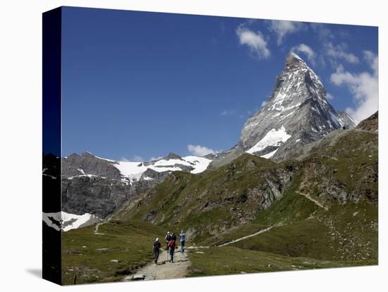 Hikers Below the Matterhorn, Zermatt, Valais, Swiss Alps, Switzerland, Europe-Hans Peter Merten-Stretched Canvas