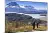 Hikers Descend a Grassy Slope with Lake-Eleanor Scriven-Mounted Photographic Print