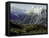 Hikers Look up at Snowy Mountain Top, New Zealand-Michael Brown-Framed Stretched Canvas