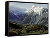 Hikers Look up at Snowy Mountain Top, New Zealand-Michael Brown-Framed Stretched Canvas