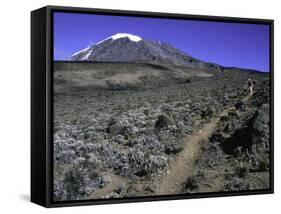 Hikers Moving Through a Rocky Area, Kilimanjaro-Michael Brown-Framed Stretched Canvas