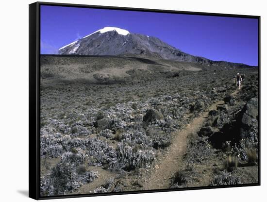 Hikers Moving Through a Rocky Area, Kilimanjaro-Michael Brown-Framed Stretched Canvas