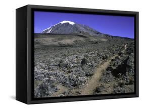 Hikers Moving Through a Rocky Area, Kilimanjaro-Michael Brown-Framed Stretched Canvas