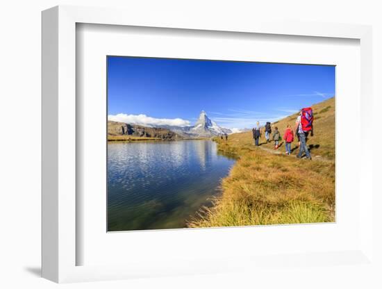 Hikers Walking on the Path Beside the Stellisee with the Matterhorn Reflected-Roberto Moiola-Framed Photographic Print