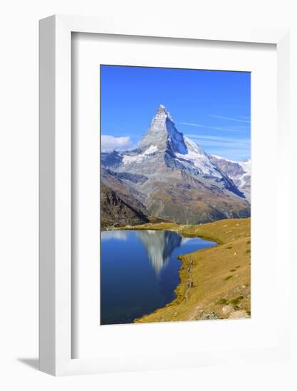Hikers Walking on the Path Beside the Stellisee with the Matterhorn Reflected-Roberto Moiola-Framed Photographic Print