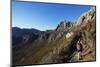 Hikers walking to Pic Boby, Andringitra National Park, Ambalavao, central area, Madagascar, Africa-Christian Kober-Mounted Photographic Print