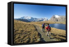 Hikers Wallking Along Rosset Lake, Gran Paradiso National Park, Alpi Graie (Graian Alps), Italy-Roberto Moiola-Framed Stretched Canvas