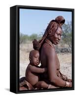 Himba Mother and Child Ride Home on Donkey, Bodies Gleaming from a Red Ochre Mixture, Namibia-Nigel Pavitt-Framed Stretched Canvas