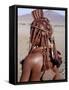 Himba Woman in Traditional Attire, Her Body Gleams from a Red Ochre Mixture of Red Ochre, Namibia-Nigel Pavitt-Framed Stretched Canvas