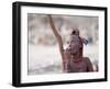 Himba Woman Smokes Outside Her Thatched Home in the Tiny Village, Purros, Namibia, Africa-Kim Walker-Framed Photographic Print