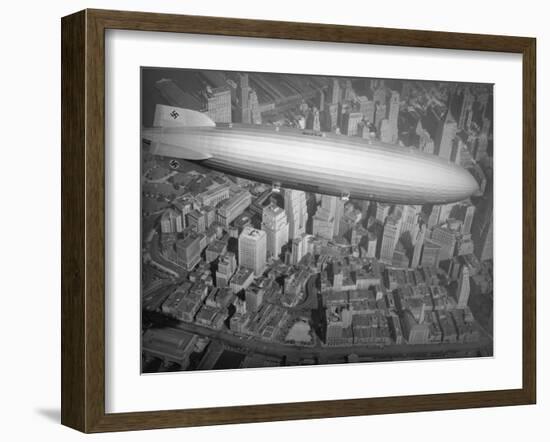 Hindenburg Flying over Manhattan-null-Framed Photographic Print