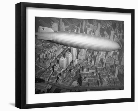 Hindenburg Flying over Manhattan-null-Framed Photographic Print