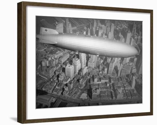 Hindenburg Flying over Manhattan-null-Framed Photographic Print