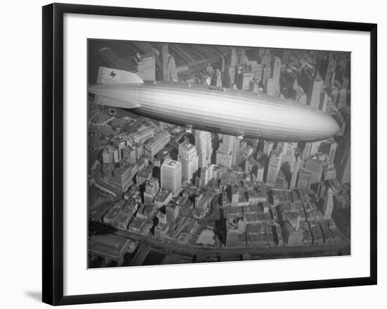 Hindenburg Flying over Manhattan-null-Framed Photographic Print