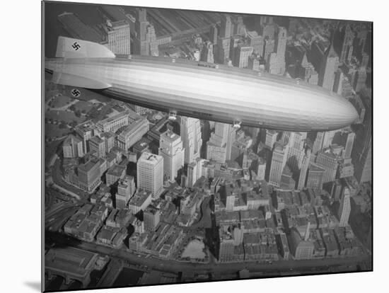 Hindenburg Flying over Manhattan-null-Mounted Photographic Print