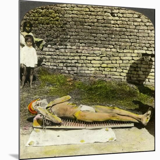 Hindu Devotee on a Bed of Nails Near the Shrine of Kali, Calcutta, India, Early 20th Century-Underwood & Underwood-Mounted Giclee Print