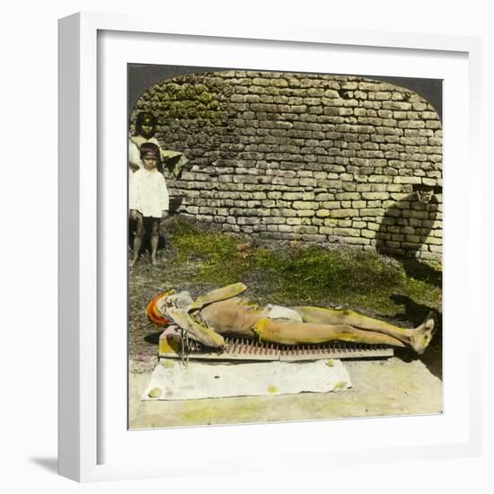 Hindu Devotee on a Bed of Nails Near the Shrine of Kali, Calcutta, India, Early 20th Century-Underwood & Underwood-Framed Giclee Print