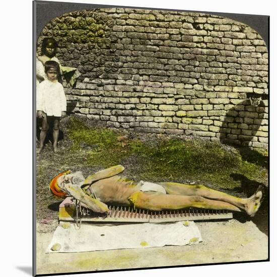 Hindu Devotee on a Bed of Nails Near the Shrine of Kali, Calcutta, India, Early 20th Century-Underwood & Underwood-Mounted Giclee Print