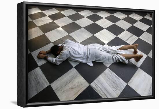 Hindu devotee prostrating at Krishna-Balaram temple, Vrindavan, Uttar Pradesh, India-Godong-Framed Photographic Print