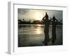 Hindu Devotees Offer Prayers to the Sun God at Sunset-null-Framed Premium Photographic Print