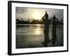 Hindu Devotees Offer Prayers to the Sun God at Sunset-null-Framed Photographic Print