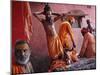 Hindu Holy Men Relax after Taking Holy Dip in River Ganges During the Kumbh Mela Festival in India-null-Mounted Photographic Print