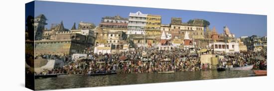 Hindus Bathing in Early Morning in Holy River Ganges Along Dasaswamedh Ghat, Varanasi, India-Gavin Hellier-Stretched Canvas