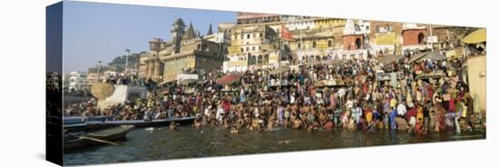 Hindus Bathing in the Early Morning in the Holy River Ganges Along Dasswamedh Ghat, Varanasi, India-Gavin Hellier-Stretched Canvas