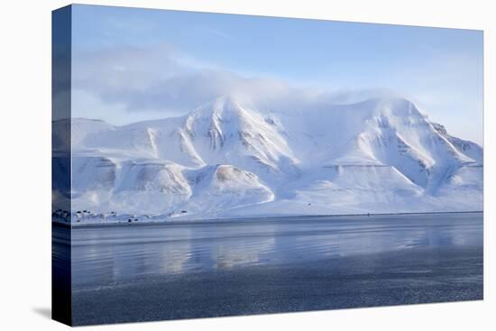 Hiorthfjellet Mountain, Adventfjorden (Advent Bay) Fjord with Sea Ice in Foreground, Svalbard-Stephen Studd-Stretched Canvas